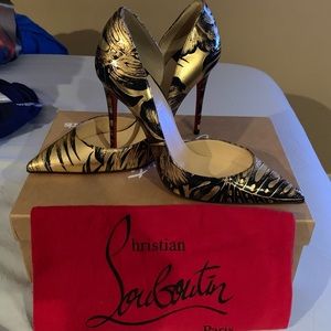 Christian Louboutin Black and Gold shoes